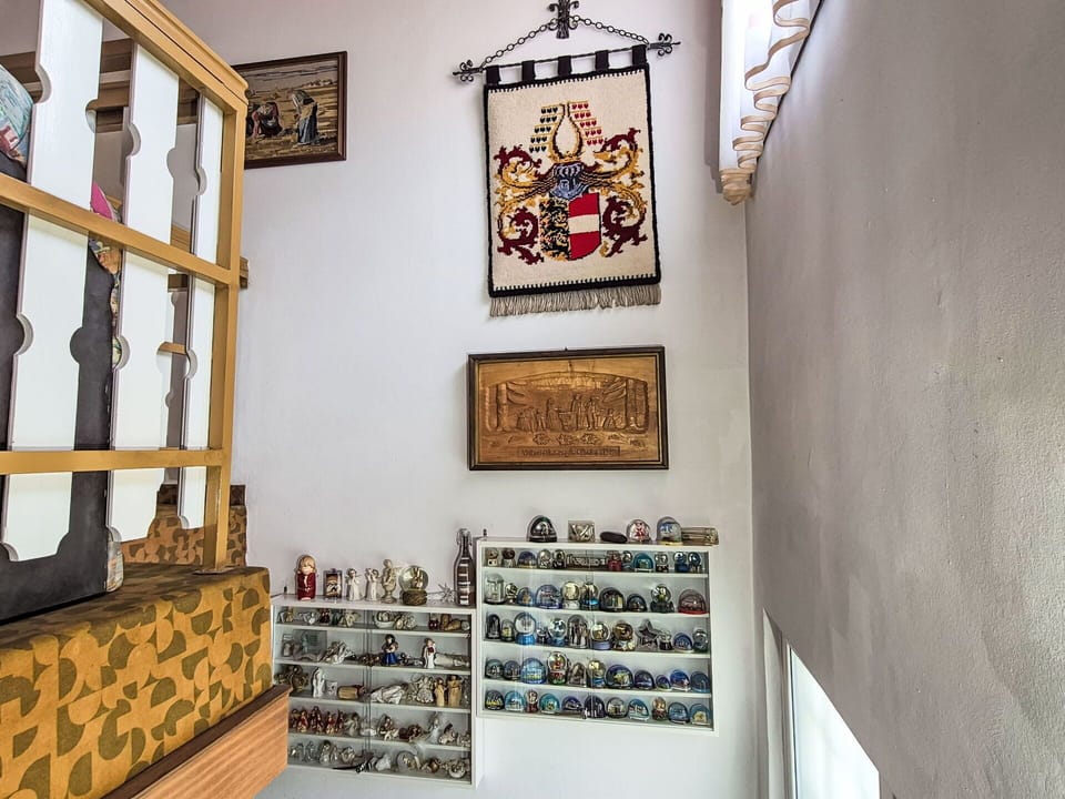 Wall, Interior Design, Shelving, Shelf, Lighting, Flooring, Furniture, Room, Picture Frame, Collection