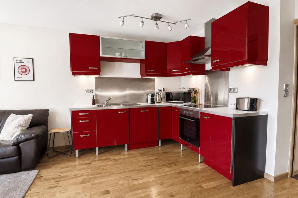 A vibrant, fully equipped kitchen.