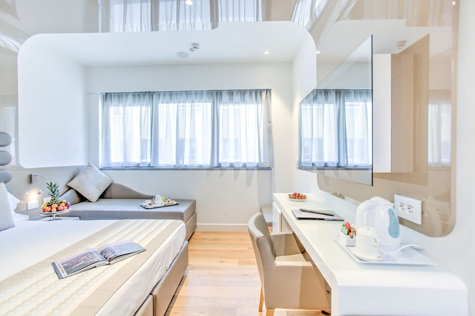 Family Double Room | Minibar, in-room safe, desk, blackout drapes