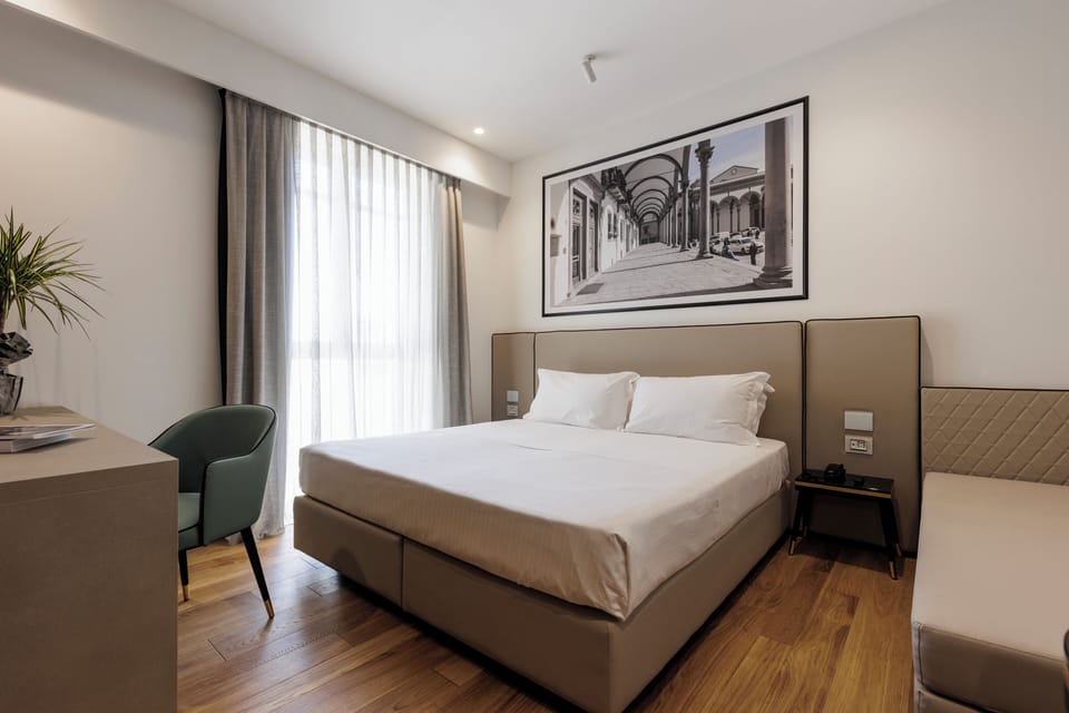 Superior Triple Room (with Spa Access) | Minibar, in-room safe, desk, blackout drapes