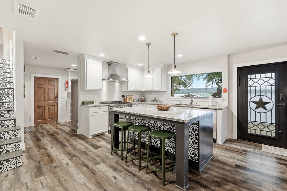 Fully stocked kitchen with basic necessities.