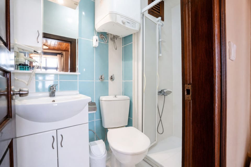 Superior Double Room, Sea View | Bathroom | Shower, hair dryer, towels, soap