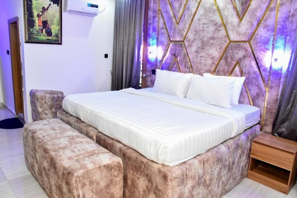 Deluxe Room, Balcony, City View | Desk, laptop workspace, blackout drapes, soundproofing