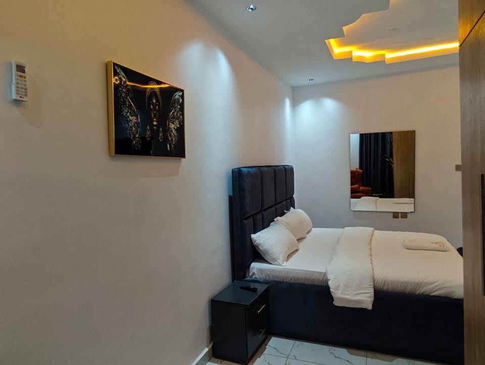 Economy Apartment, Balcony, City View | In-room safe, desk, laptop workspace, blackout drapes