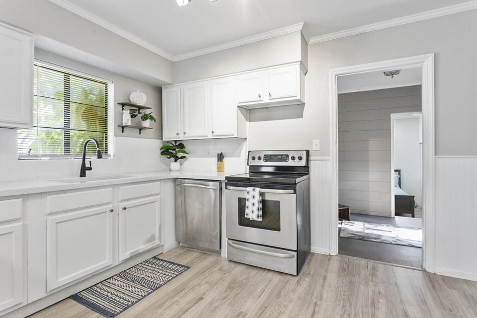 Gather in the spacious kitchen, complete with seating for six