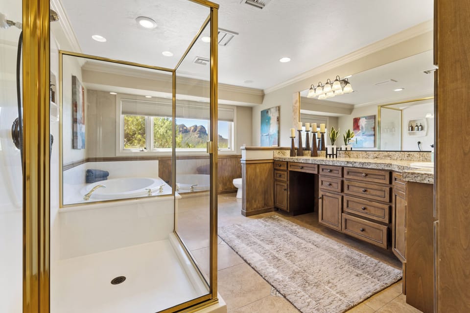 Primary bathroom with shower and soaking tub