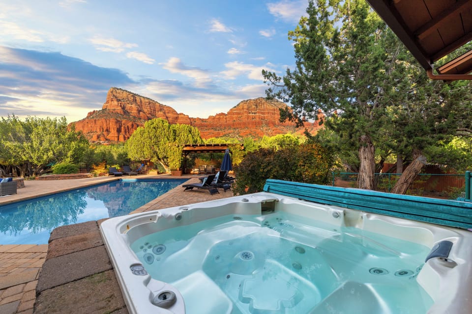 Relaxation awaits! Hot Tub with Scenic Red Rock backdrop.