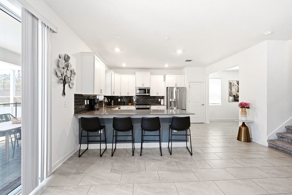 Oversized island perfect for gathering and casual dining.