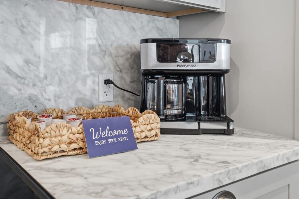 Kitchen with coffee maker and everyday essentials