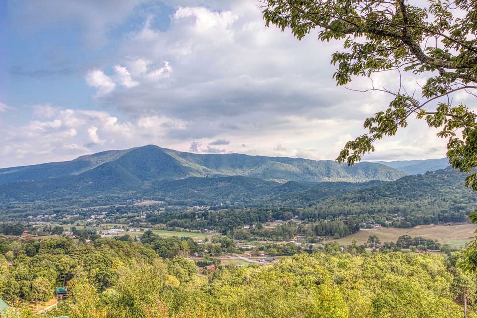 A stunning natural backdrop of rolling mountains and open skies in the Smokies