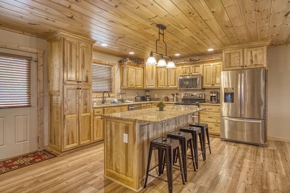 Gather around the kitchen island for coffee, conversation, and connection throughout your stay