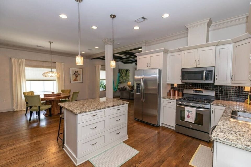 Gas stove kitchen stocked for longer stays and shared meals.