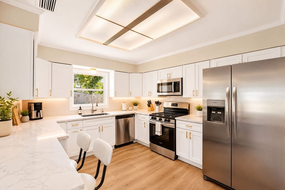 Fully equipped kitchen with sleek, modern appliances.
