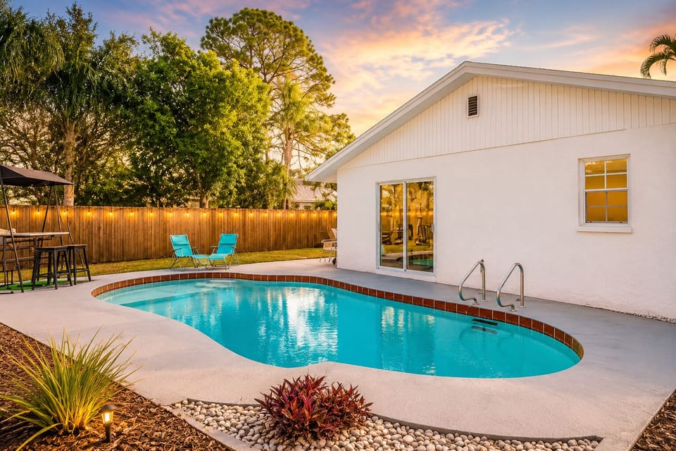 Lounge by the pool with ample seating options.

