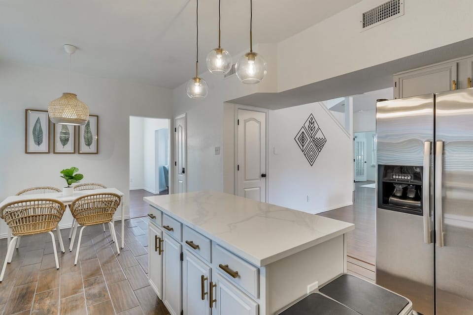 A spacious, modern kitchen where cooking becomes a joy, offering plenty of room to gather, prep, and entertain with ease.