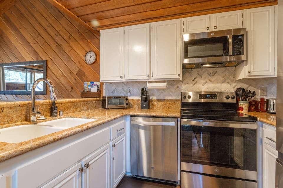Updated kitchen w/ stainless steel appliances.
