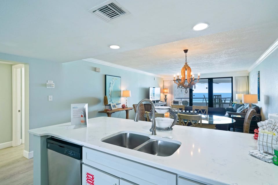 Guests can prepare unforgettable meals while being a part of the action in this open concept condo.