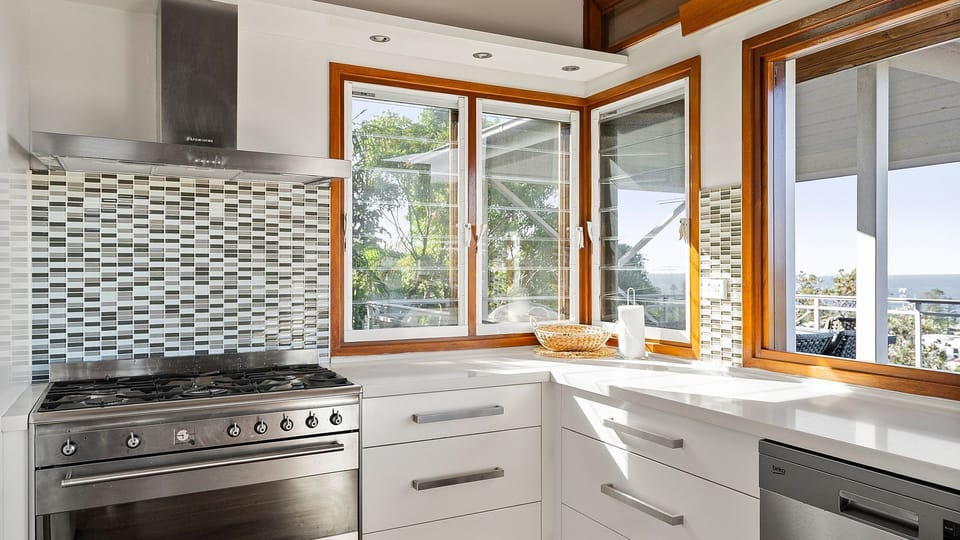Clean, spacious kitchen made for shared moments and great meals.