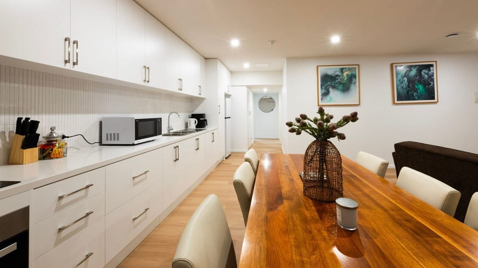 Dedicated dining area suitable for meals, takeaway, or working from home.