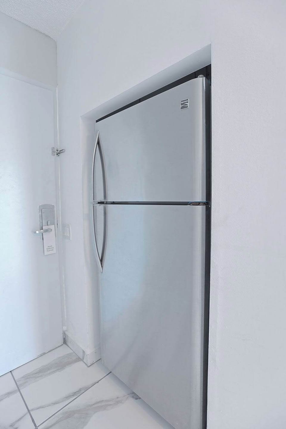 Full‑size stainless‑steel refrigerator offers plenty of space for groceries, chilled drinks, and leftovers for longer Isla Verde stays.