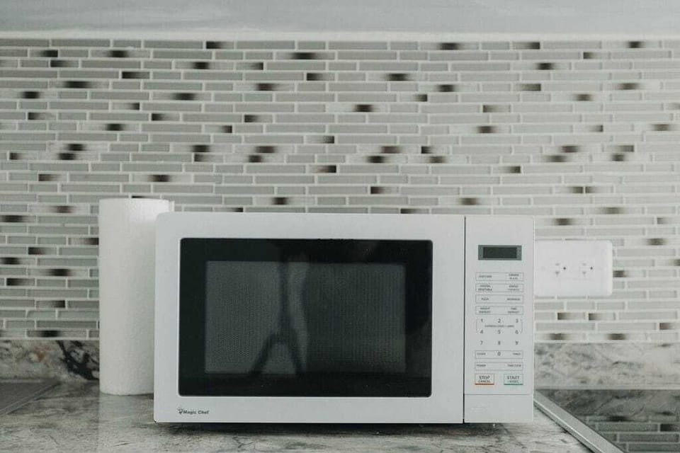 Compact Magic Chef microwave makes reheating leftovers from Isla Verde’s top restaurants or warming midnight snacks quick and effortless.