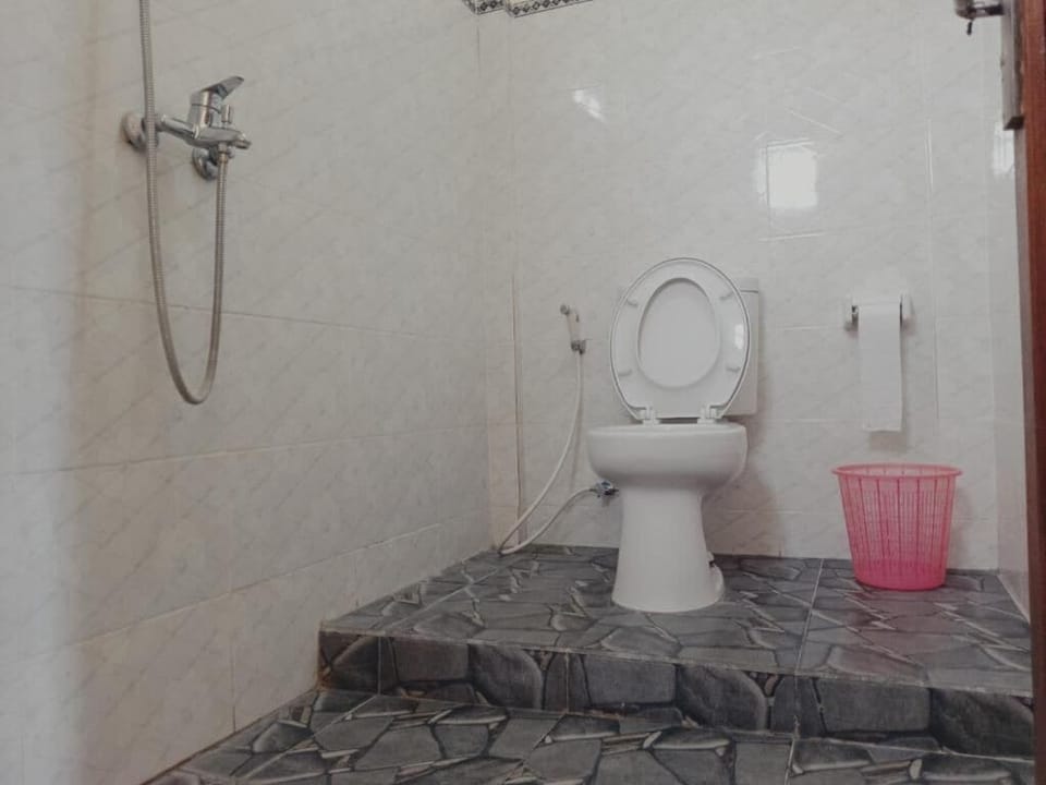 Economy Double Room, Balcony, City View | Bathroom | Shower, free toiletries, towels, soap