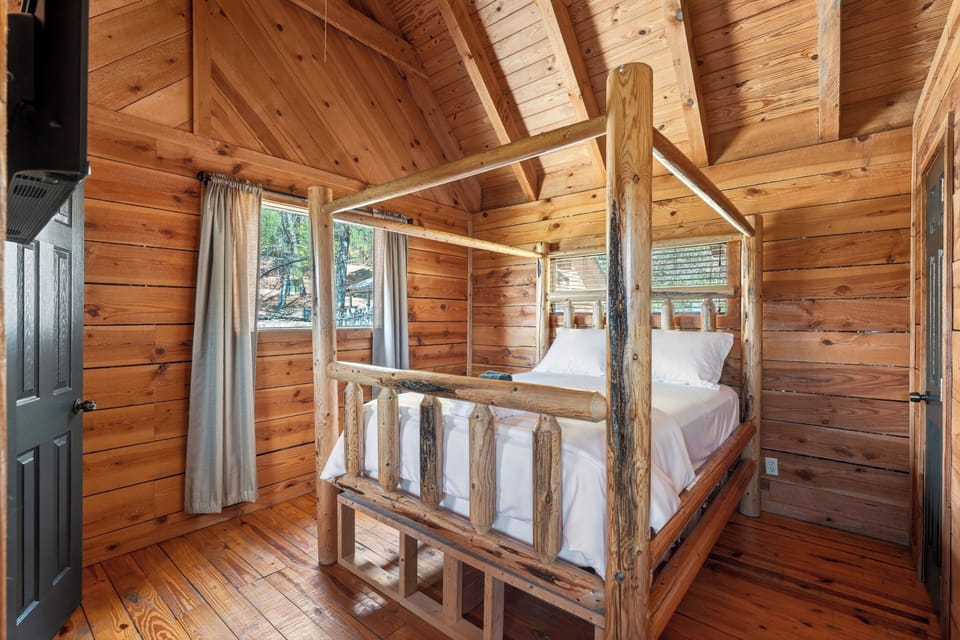 Bedroom 2 features a queen bed, TV and an ensuite bathroom. (Isaiah's Cabin)
