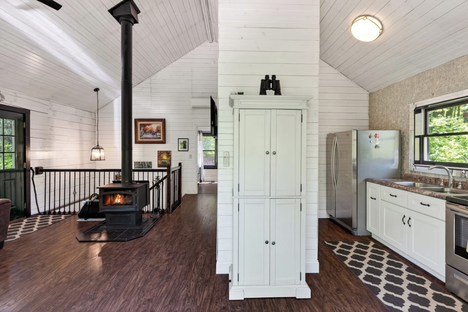 Centrally located storage and high ceilings maximize the living space.