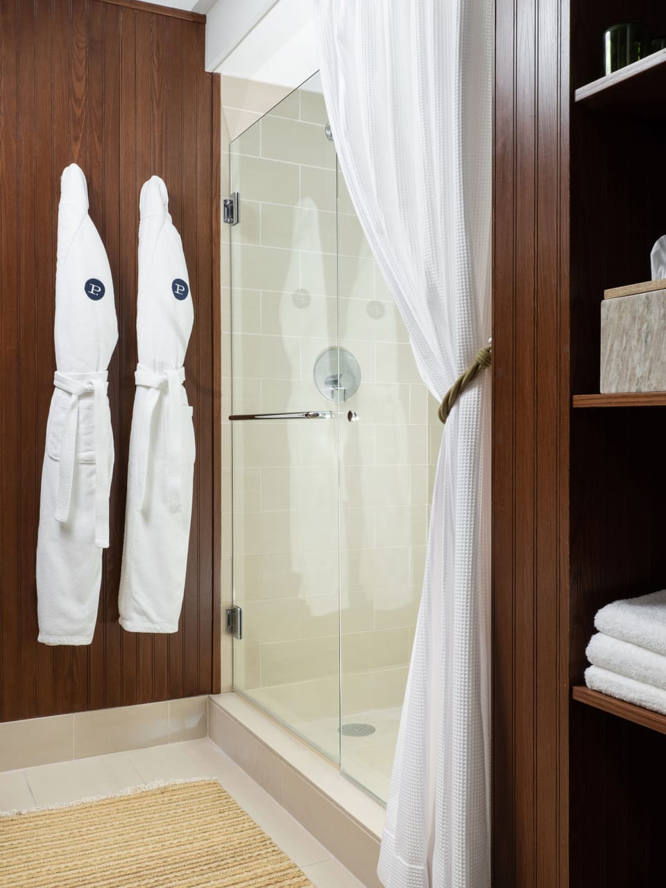 Designer toiletries, hair dryer, bathrobes, slippers