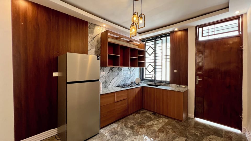 Apartment | Private kitchen | Full-size fridge, microwave, oven, cookware/dishes/utensils