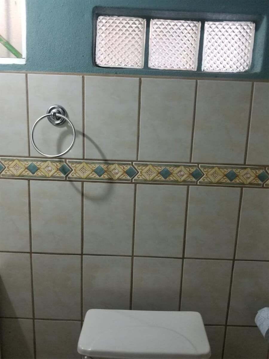 The private full bathroom features a walk-in shower, modern vanity, and toilet — attached directly to the studio suite .