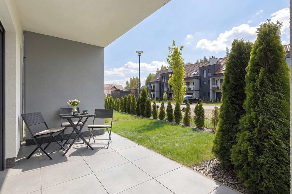 Private terrace with outdoor seating, ideal for enjoying your morning coffee or evening drinks.