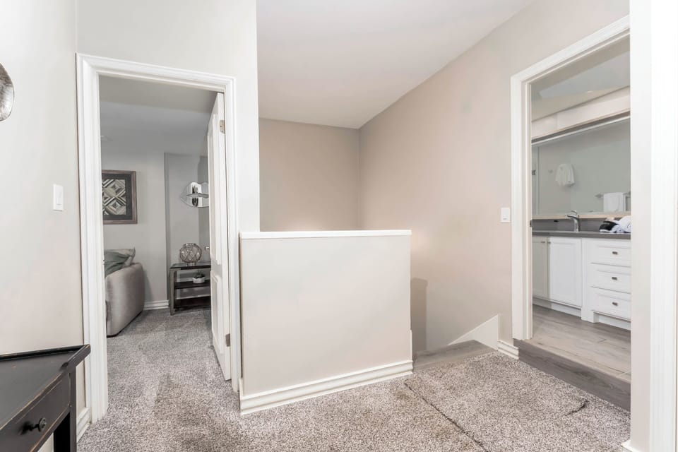 Upstairs Hallway, with Guest Restroom Entrance and 1 or 3 bedrooms