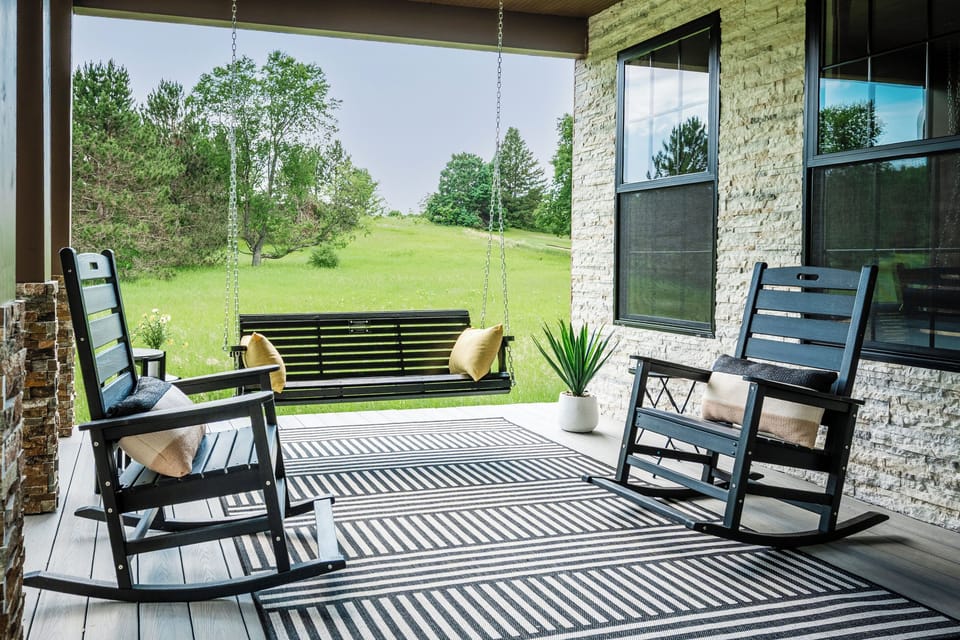Front porch swing and rocking chairs
