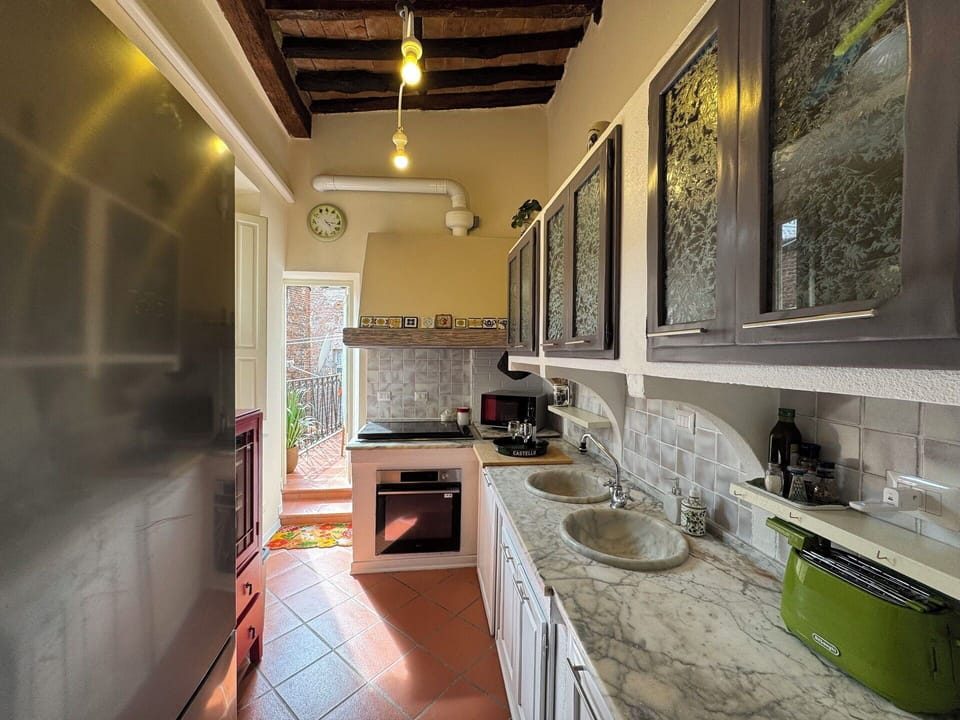 Kitchen, Interior Design, Countertop, Furniture, Flooring, Kitchen Appliance, Major Appliance, Wood, Ceiling, Floor