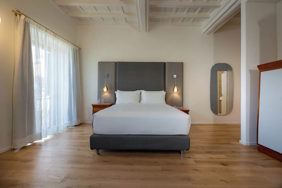 Deluxe Room, City View | Premium bedding, down comforters, memory foam beds, minibar