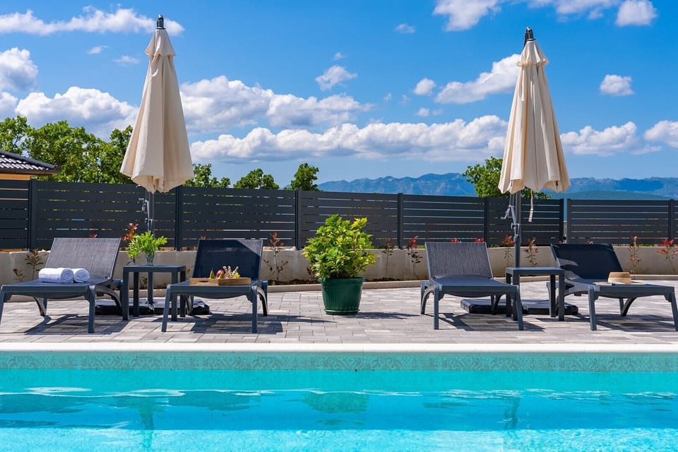 Large 8m x 4m heated swimming pool with a sun deck exclusively for your use.