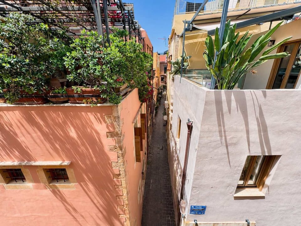 Traditional stone façade located in a charming alley of Chania’s historic center
