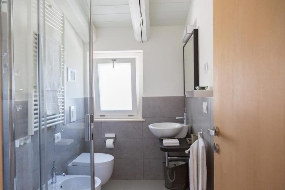 Family Suite, Patio, Garden View | Bathroom | Free toiletries, hair dryer, bidet, towels