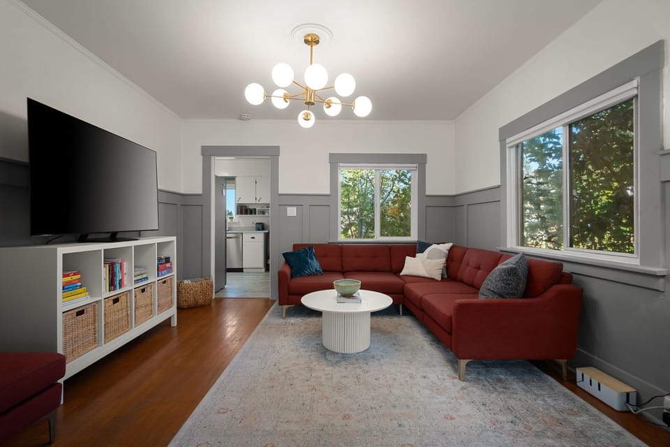 Relax in the inviting living space with comfortable seating and warm modern touches.