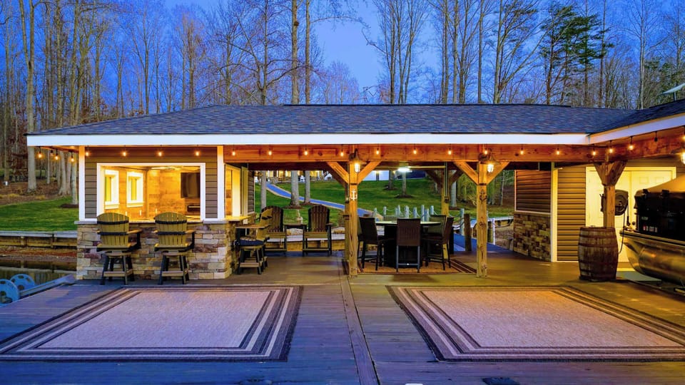 Backyard - A long sloped lawn runs from the house down to the dock and waterfront, plenty of room to spread out along the way.