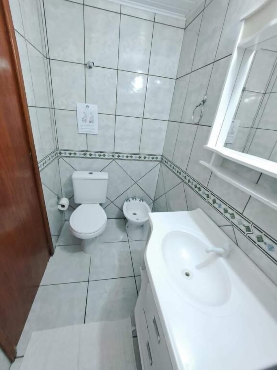 Combined shower/tub, hair dryer, towels, toilet paper