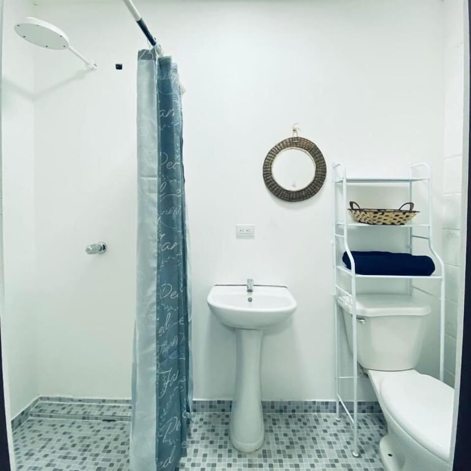 Basic Double Room, Courtyard View | Bathroom | Towels, soap, toilet paper