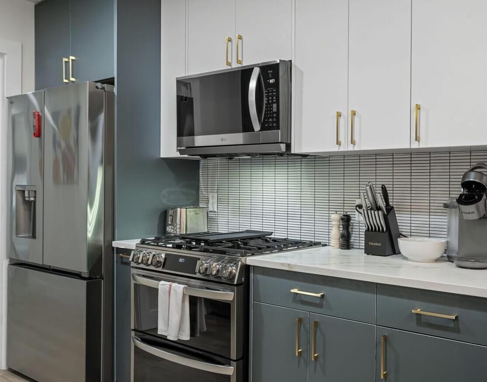 Brew your morning coffee with the Keurig or go full chef mode on the five-burner gas cooktop.
