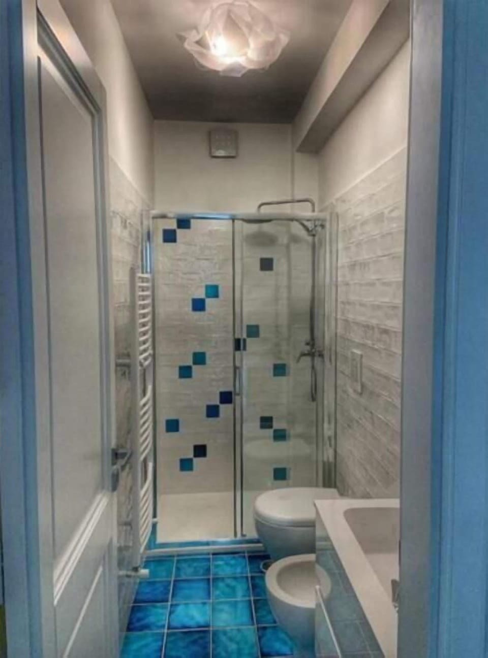Shower, free toiletries, hair dryer, bathrobes