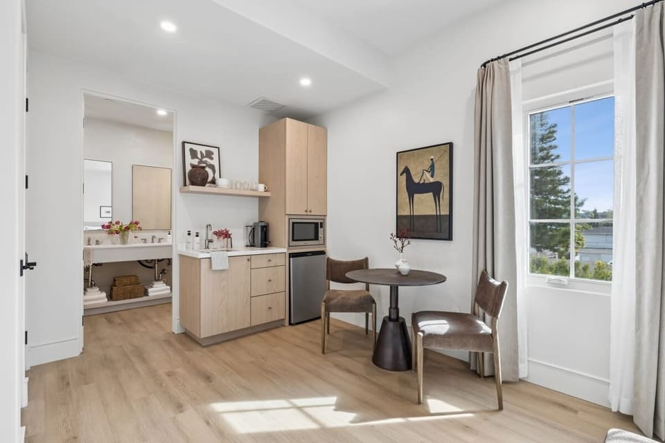 Kitchenette with Nespresso Coffee Machine and Mini Fridge - Seating area