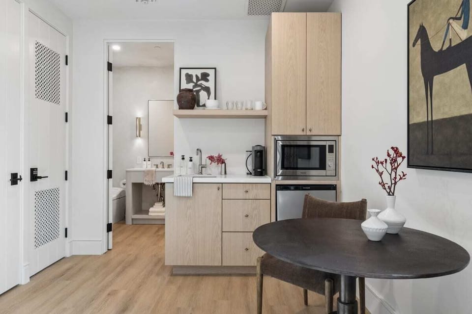 Kitchenette with Nespresso Coffee Machine and Mini Fridge - Seating area