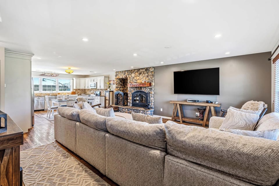 River-rock fireplace with twin inserts in open living area