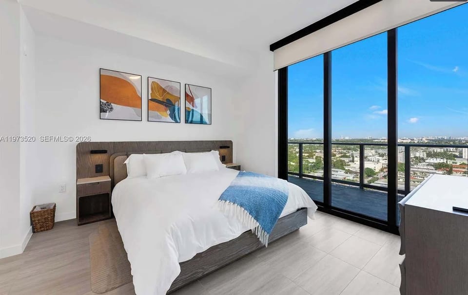 Crisp, plush bedding for a restful stay.