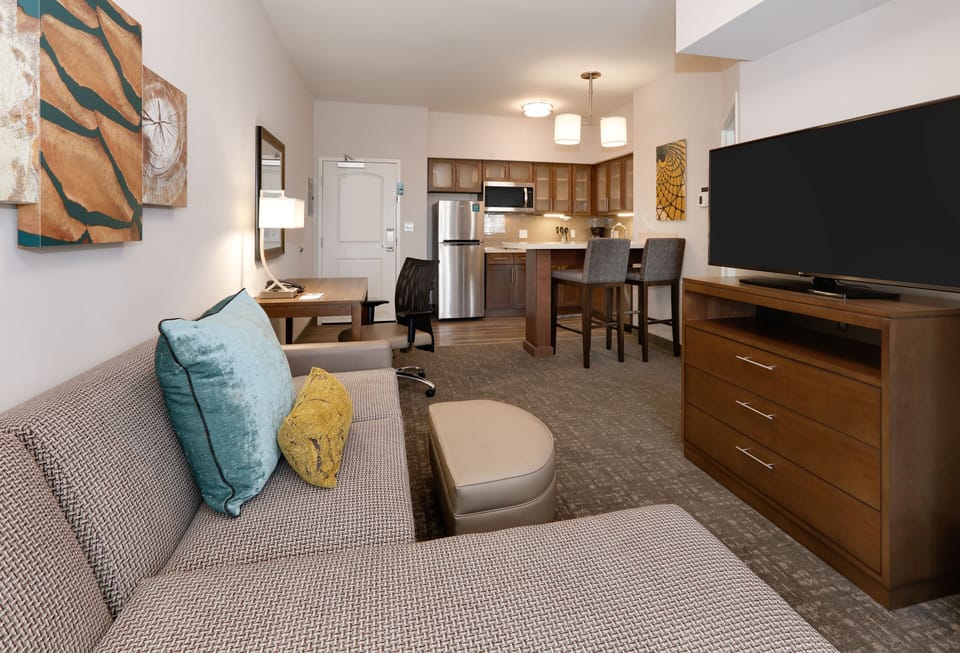 Stylish full kitchen with modern appliances and ample counter space.